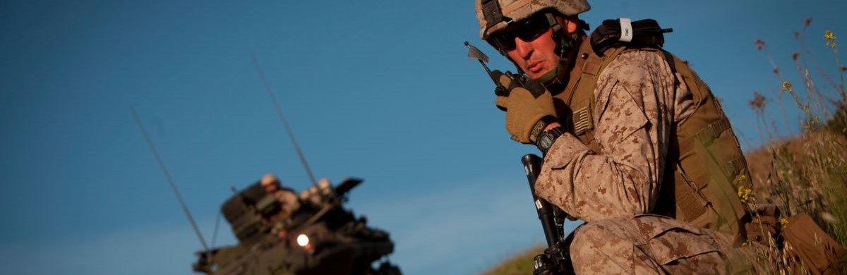 Marine Corps Staff Sgt. Brian Sears relays an update to his platoon commander during an exercise at Camp Pendleton, Calif.